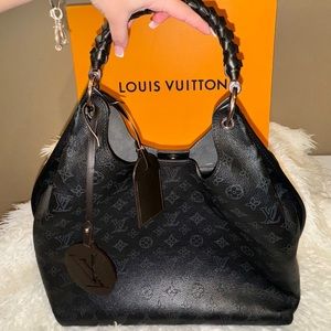 Louis Vuitton Carmel Mahina bag in black.